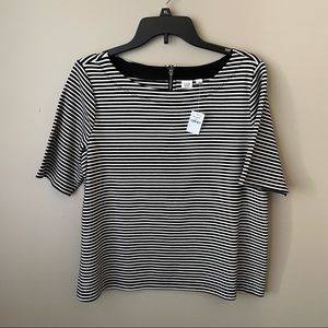 Gap large short sleeve shirt. Black and white stripes, classic. Zipper in back.